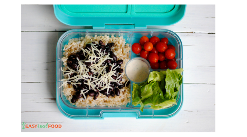 Black beans atop brown rice with cherry tomatoes and romaine on the side: a quick, healthy lunch