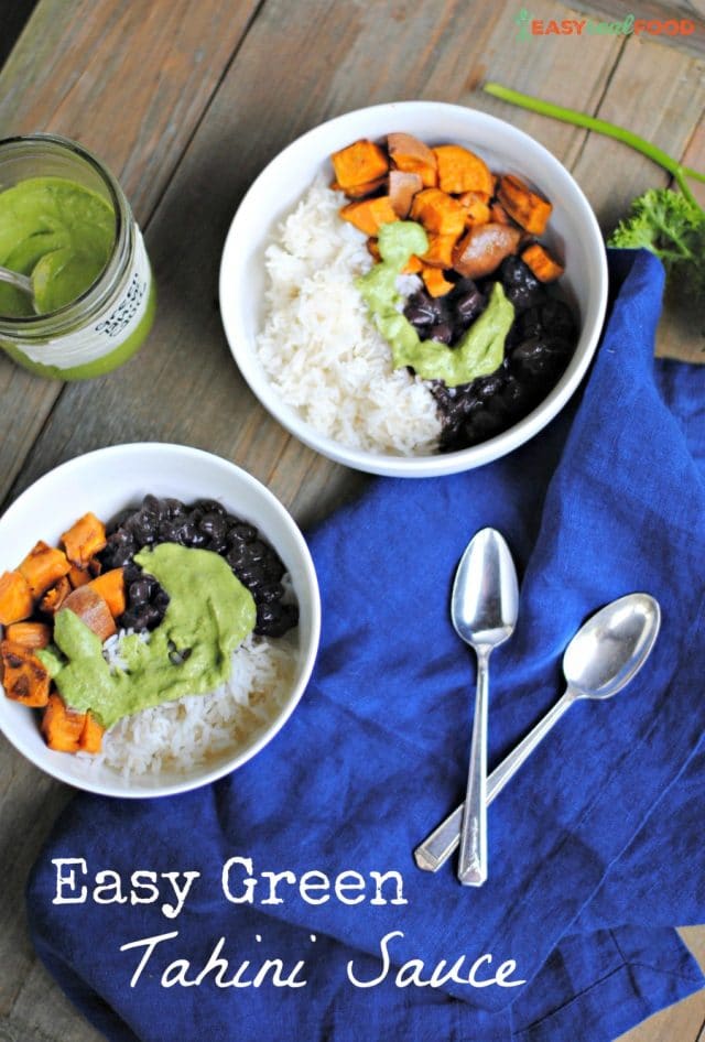 Easy green tahini sauce on a grain bowl of rice, sweet potatoes and black beans