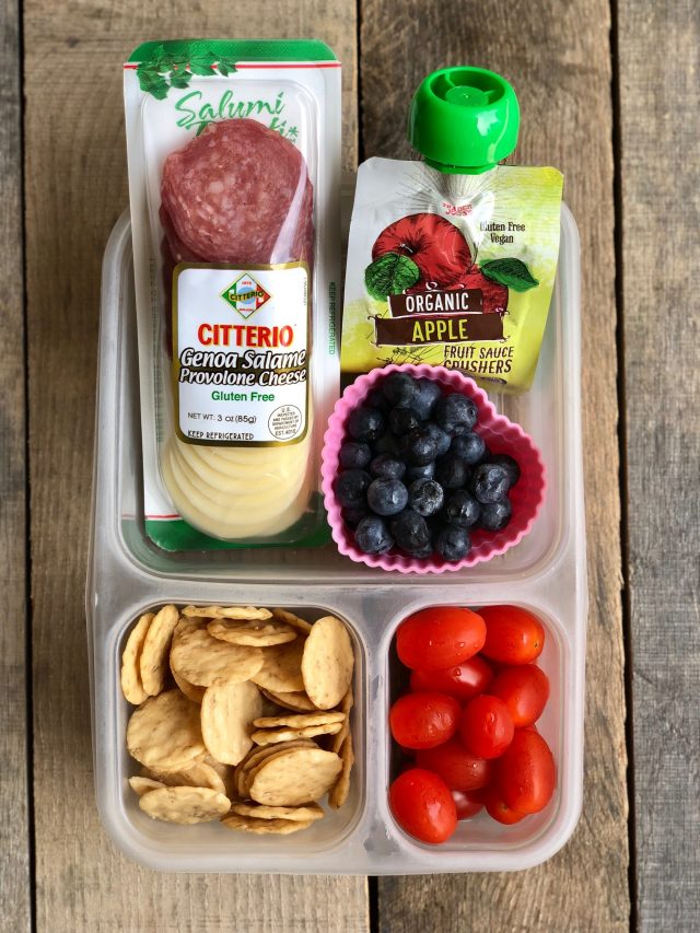 10 Simple School Lunches from Trader Joe's - salami & cheese snack pack, applesauce, gluten free crackers, tomatoes and blueberries. #healthykids #healthytraderjoes