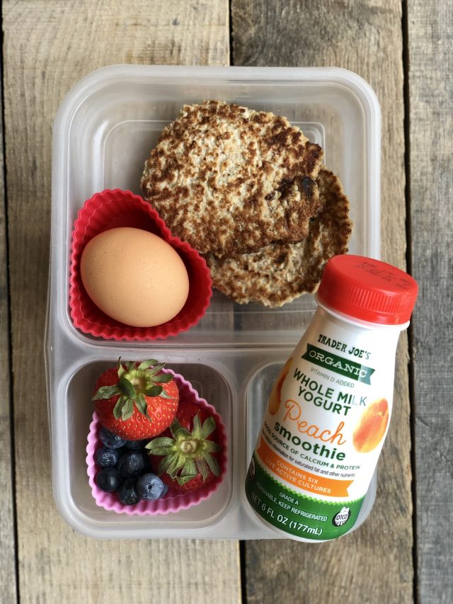 10 Simple School Lunches from Trader Joe's - homemade pancakes, fresh fruit, a hard boiled egg and an organic yogurt smoothie. 