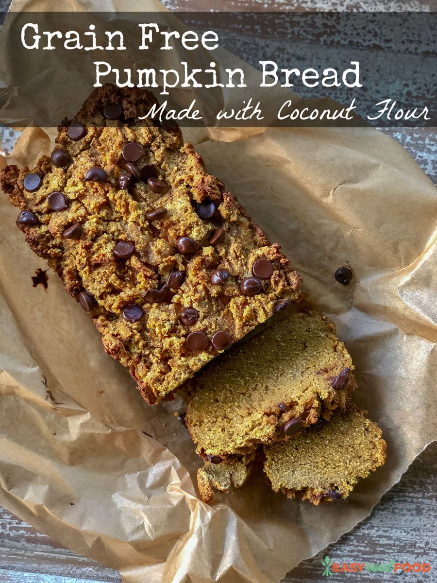 A loaf of grain free pumpkin bread made with coconut flour on parchment paper. - #coconutflourrecipe