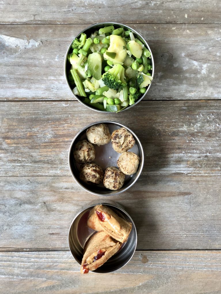 pb and j sandwich with meatballs and mixed green veggies