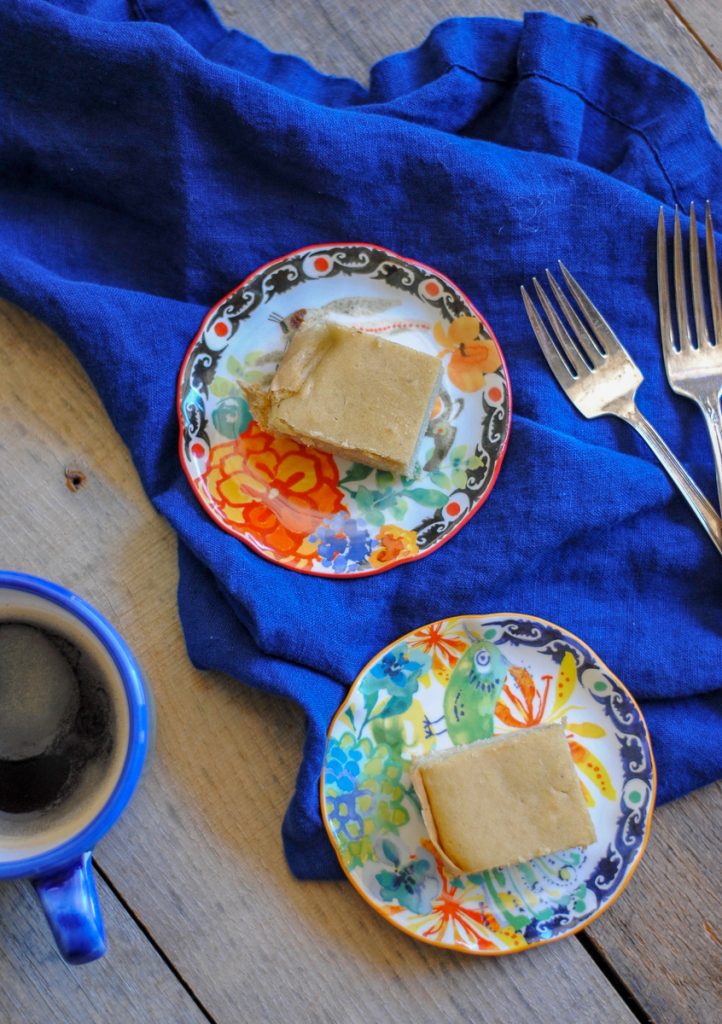 Two pieces of almond cake on plates