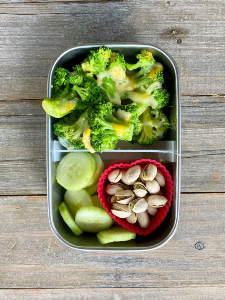 broccoli with cheese, cucumber and pistachios in a U Konserve lunch box