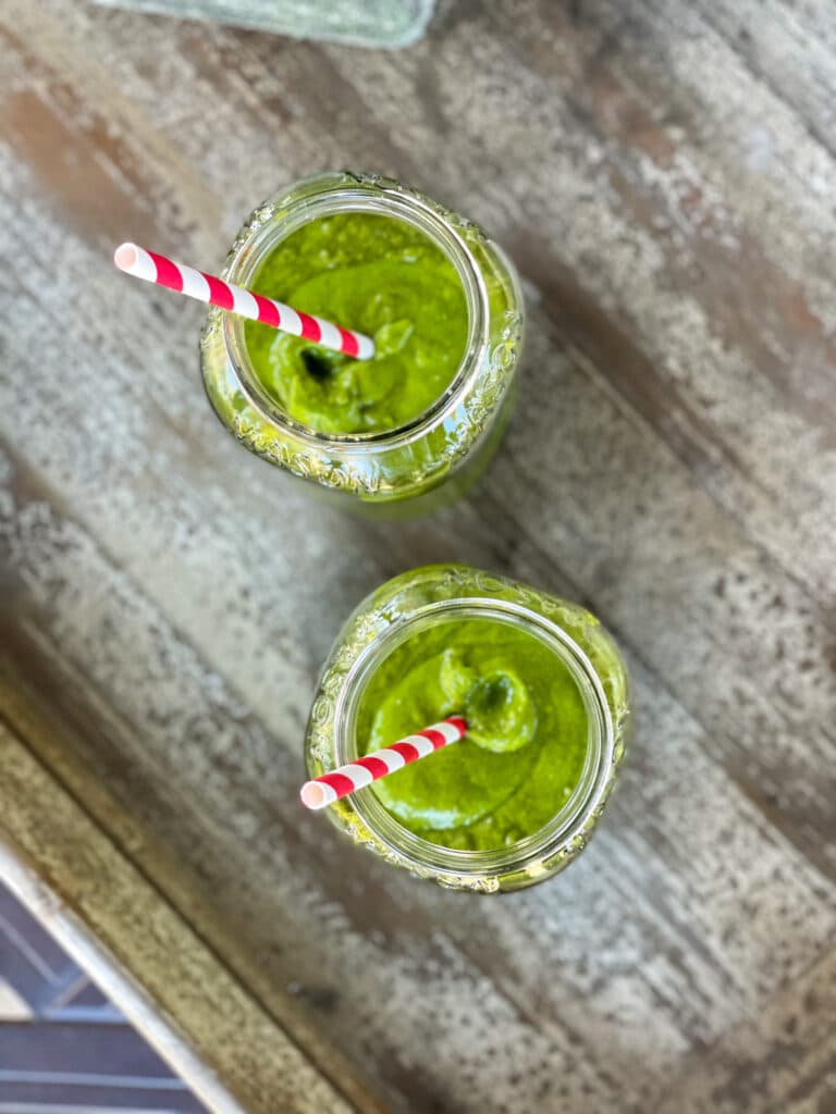 top down look at two green anti-inflammatory smoothies